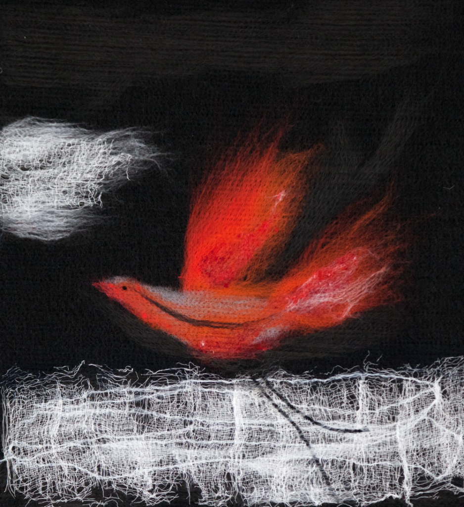 Červený vták na čiernom pozadí s bielymi škvrnami na pozadí.